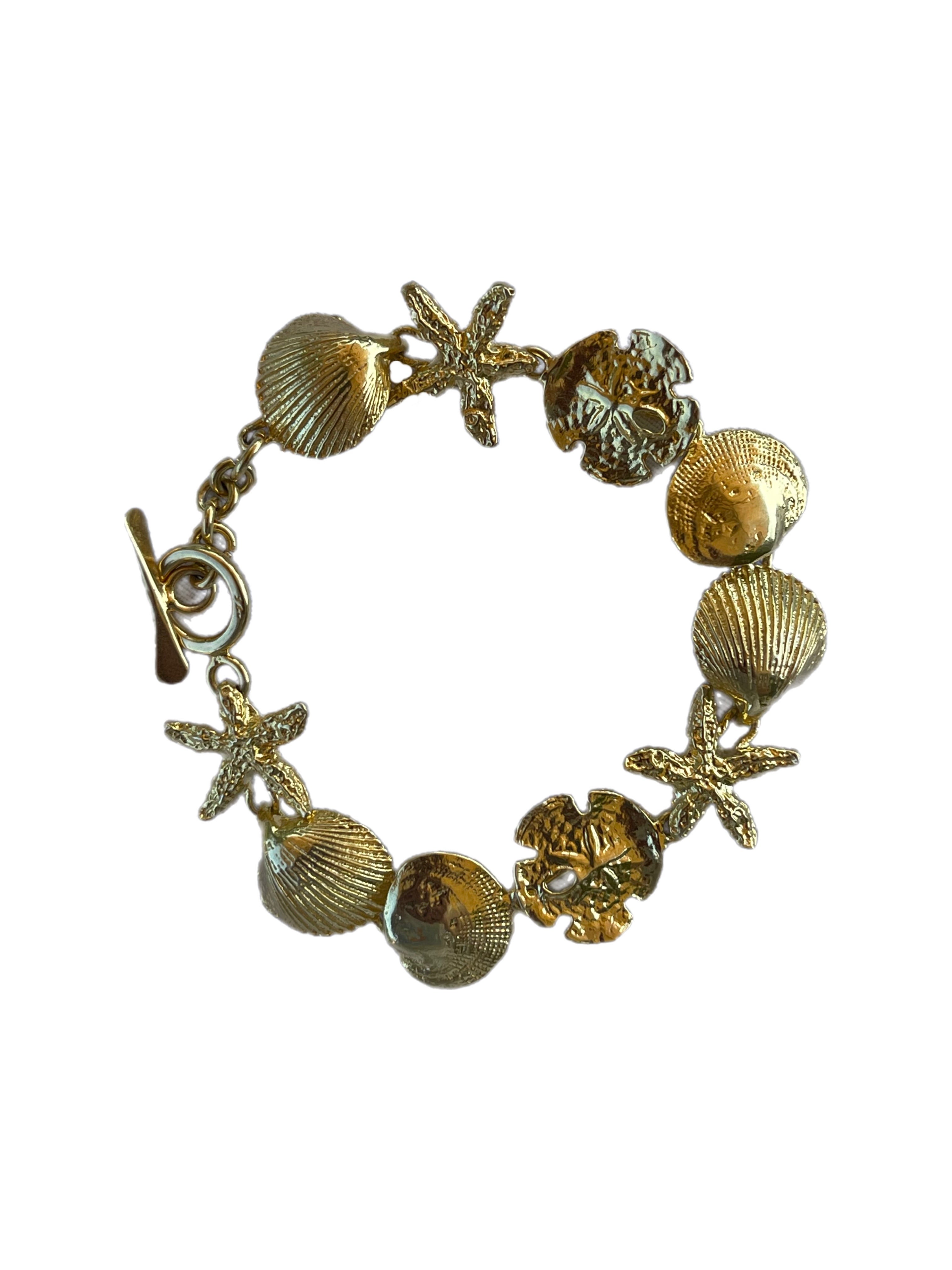 Scallop Shell Sterling Silver Bracelet with 14K Yellow Gold Wraps | The  Gilded Oyster